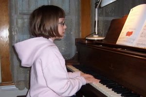 Joy playing the piano