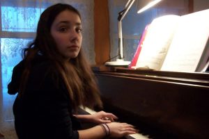 Olivia at the piano