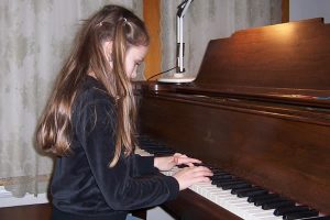 Olivia at the piano